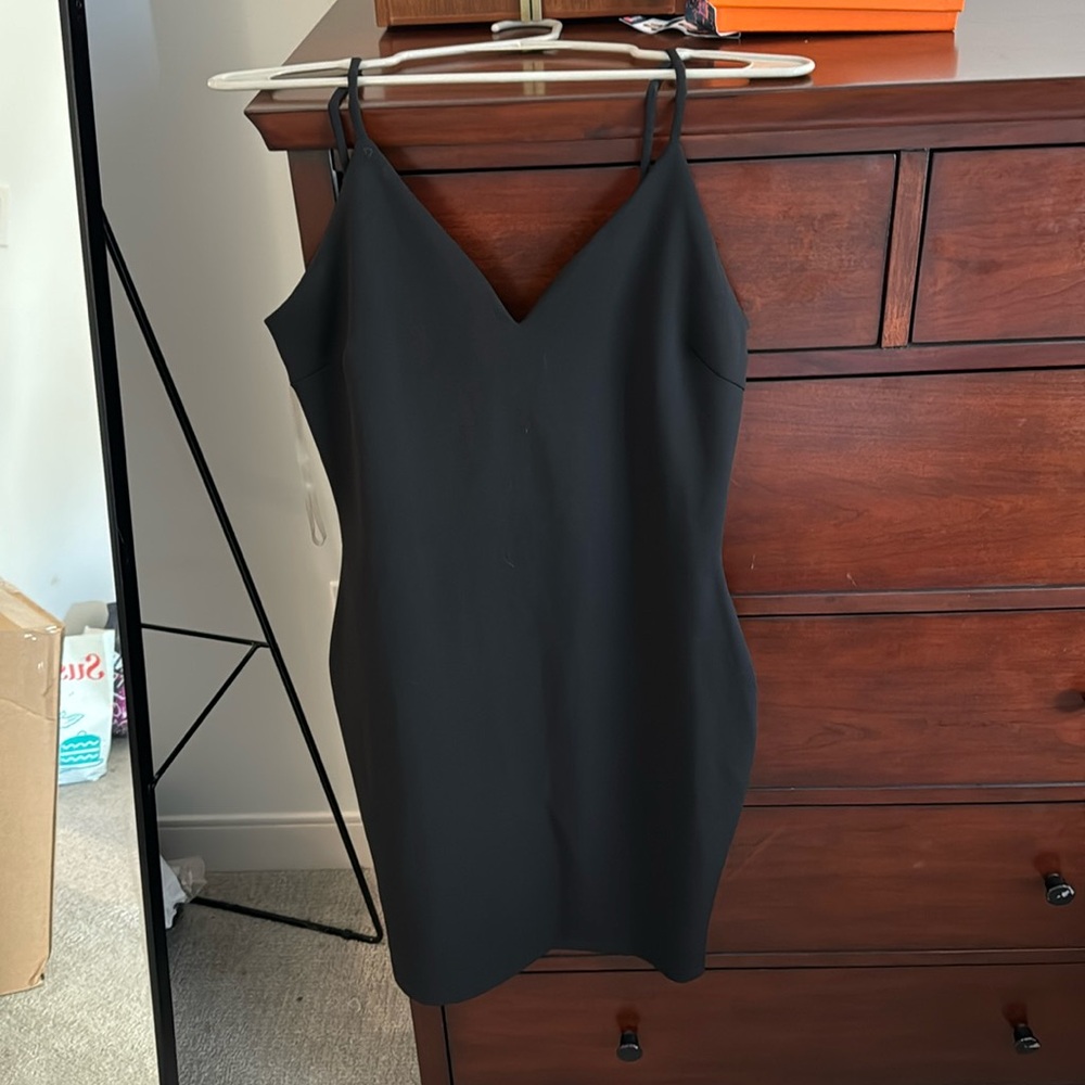 Black party dress with rhinestone back